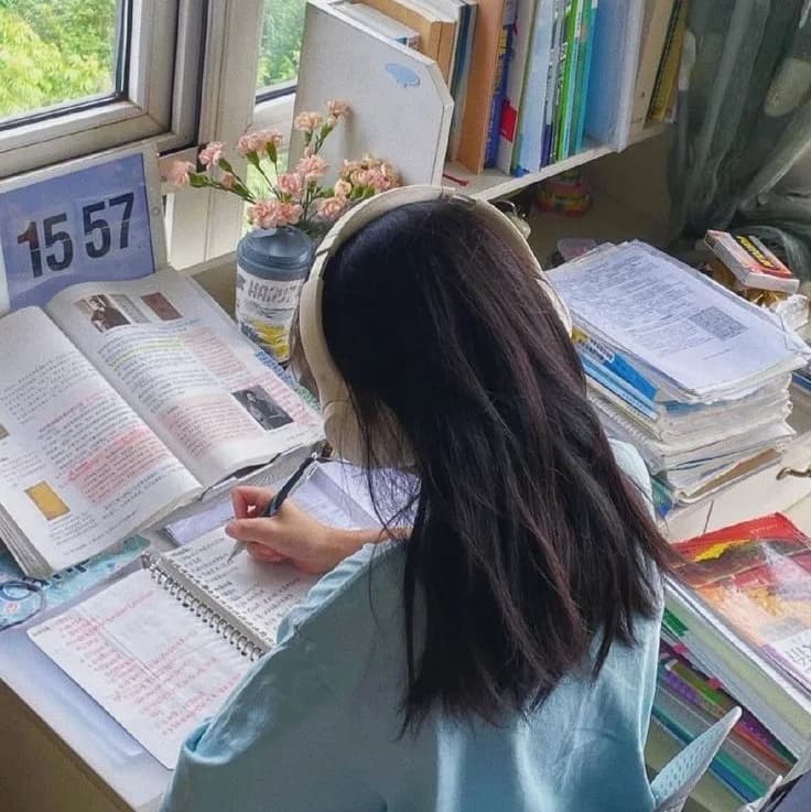 A girl studying at her desk